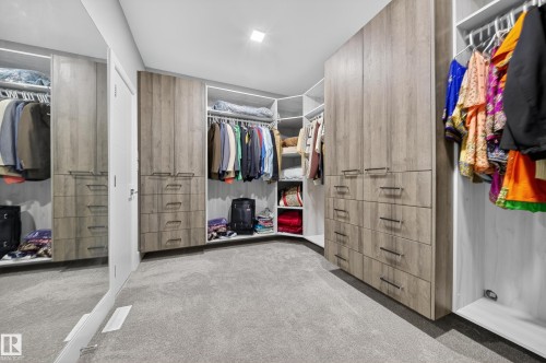 Walk in closet featuring carpet floors - 4406 Triomphe Close, Beaumont, AB - Indoor With Storage