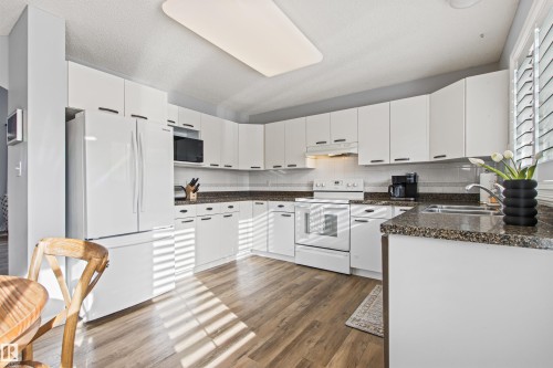 16 Desevigny Place, St. Albert, AB - Indoor Photo Showing Kitchen With Double Sink