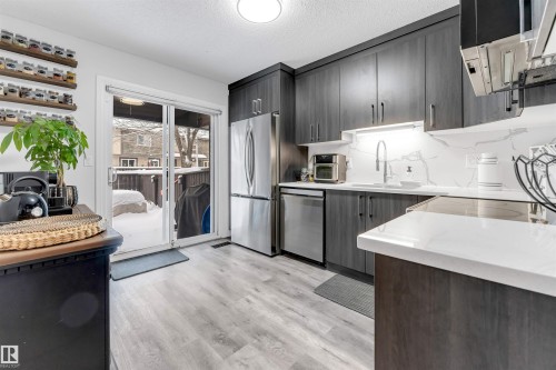 18010 96 Ave Nw, Edmonton, AB - Indoor Photo Showing Kitchen With Stainless Steel Kitchen With Upgraded Kitchen