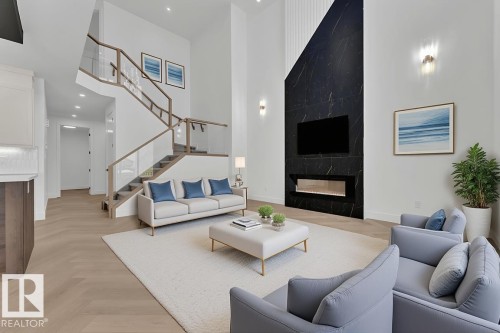 3602 44 Avenue, Beaumont, AB - Indoor Photo Showing Living Room With Fireplace