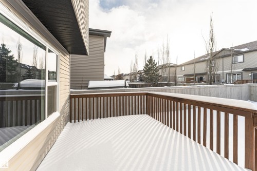 Wooden deck featuring a residential view - 6963 19A Avenue, Edmonton, AB - Outdoor With Deck Patio Veranda With Exterior