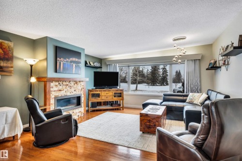 7811 134B Avenue, Edmonton, AB - Indoor Photo Showing Living Room With Fireplace