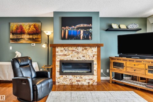 7811 134B Avenue, Edmonton, AB - Indoor Photo Showing Living Room With Fireplace
