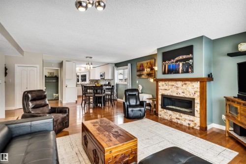 7811 134B Avenue, Edmonton, AB - Indoor Photo Showing Living Room With Fireplace