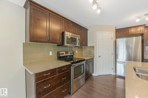 17535 13 Avenue, Edmonton, AB - Indoor Photo Showing Kitchen With Double Sink