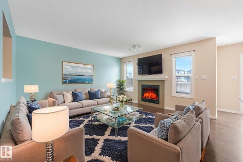 17535 13 Avenue, Edmonton, AB - Indoor Photo Showing Living Room With Fireplace