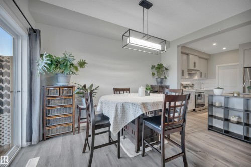 Dining area featuring light wood-type flooring and recessed lighting - 157 Larch Crescent, Leduc, AB - Indoor Photo Showing Dining Room