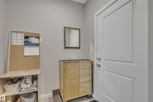 Doorway featuring baseboards - 157 Larch Crescent, Leduc, AB - Indoor Photo Showing Other Room
