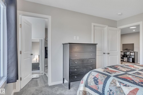 Bedroom featuring carpet and baseboards - 157 Larch Crescent, Leduc, AB - Indoor Photo Showing Bedroom