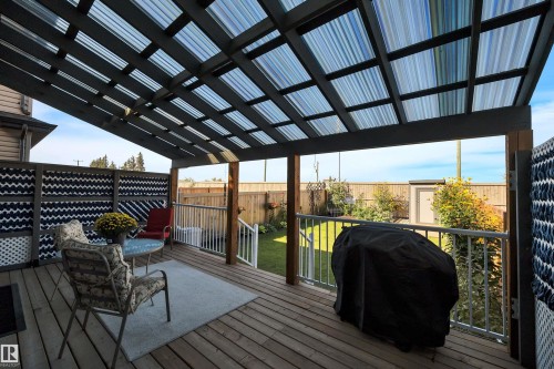 Deck with area for grilling and a fenced backyard - 157 Larch Crescent, Leduc, AB - Outdoor With Deck Patio Veranda With Exterior