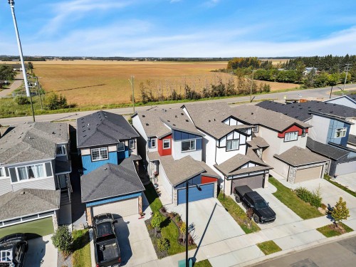 Aerial perspective of suburban area - 157 Larch Crescent, Leduc, AB - Outdoor