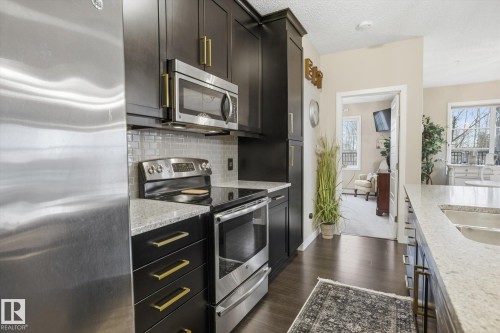 120 1144 Adamson Drive, Edmonton, AB - Indoor Photo Showing Kitchen With Stainless Steel Kitchen With Upgraded Kitchen