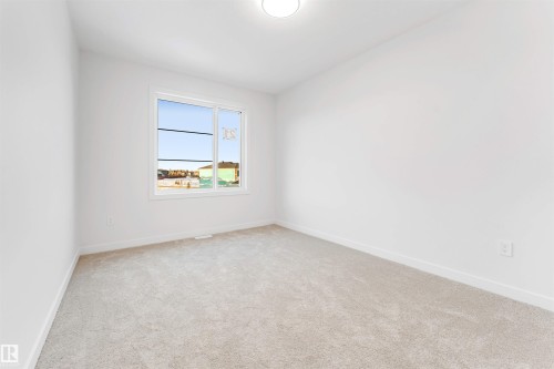 21 Trill Point(E), Spruce Grove, AB - Indoor Photo Showing Other Room