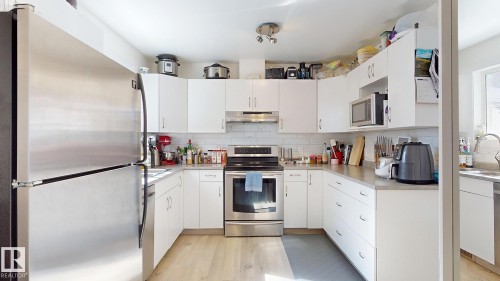 9515B 120 Avenue, Edmonton, AB - Indoor Photo Showing Kitchen With Stainless Steel Kitchen