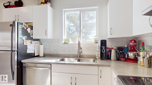 9515B 120 Avenue, Edmonton, AB - Indoor Photo Showing Kitchen With Double Sink