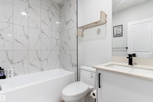 Bathroom with vanity and  shower combination - 5747 Kootook Way, Edmonton, AB - Indoor Photo Showing Bathroom