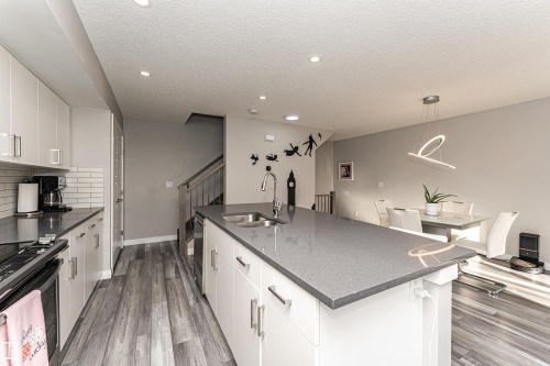 20318 15A Avenue, Edmonton, AB - Indoor Photo Showing Kitchen With Double Sink With Upgraded Kitchen