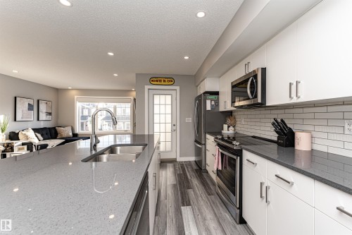20318 15A Avenue, Edmonton, AB - Indoor Photo Showing Kitchen With Double Sink With Upgraded Kitchen