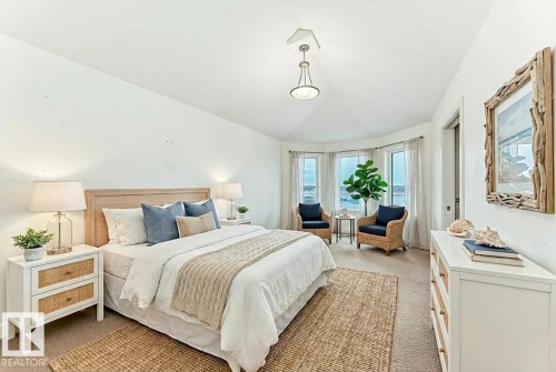 Bedroom with light carpet and vaulted ceiling - 1908 69 Street, Edmonton, AB - Indoor Photo Showing Bedroom