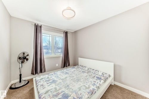 Bedroom with carpet floors - 1908 69 Street, Edmonton, AB - Indoor Photo Showing Bedroom