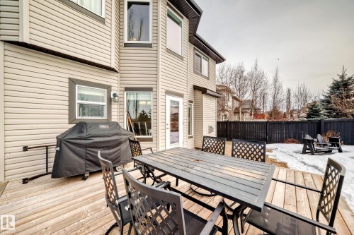 Deck with area for grilling, outdoor dining space, and a fenced backyard - 1908 69 Street, Edmonton, AB - Outdoor With Deck Patio Veranda With Exterior