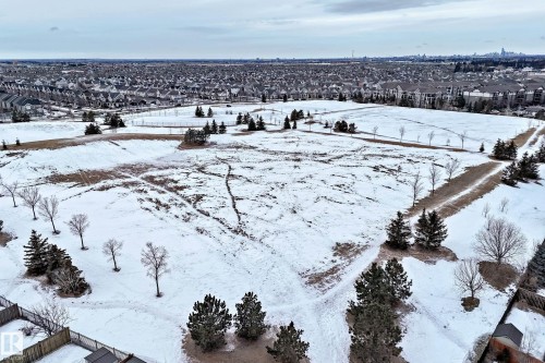 Snowy aerial view featuring a residential view - 1908 69 Street, Edmonton, AB - Outdoor With View