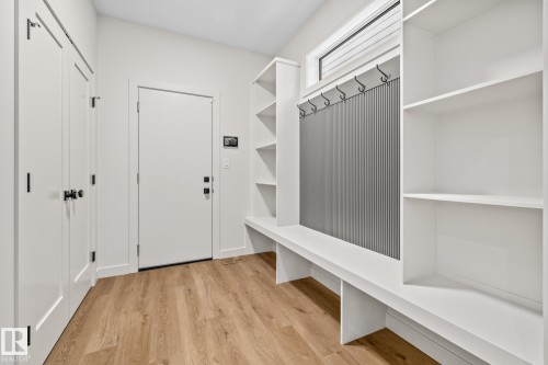 Mudroom with light wood-style flooring - 4543 Knight Wynd, Edmonton, AB - Indoor Photo Showing Other Room