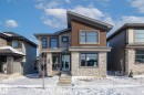 Contemporary home featuring stone siding - 4543 Knight Wynd, Edmonton, AB  - Outdoor With Facade 