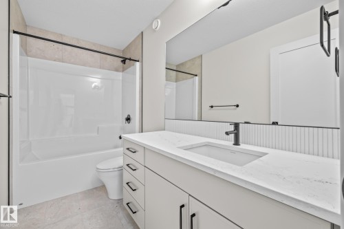 Bathroom with vanity and shower / bathtub combination - 4543 Knight Wynd, Edmonton, AB - Indoor Photo Showing Bathroom