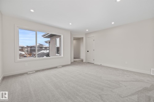 Unfurnished room with light carpet and recessed lighting - 4543 Knight Wynd, Edmonton, AB - Indoor Photo Showing Other Room