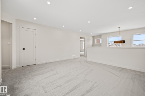 Unfurnished room featuring recessed lighting and light carpet - 4543 Knight Wynd, Edmonton, AB - Indoor Photo Showing Other Room