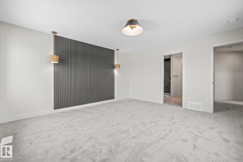 Unfurnished bedroom with light carpet - 4543 Knight Wynd, Edmonton, AB - Indoor Photo Showing Other Room