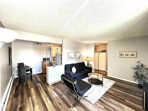 103 8310 Jasper Avenue, Edmonton, AB - Indoor Photo Showing Living Room