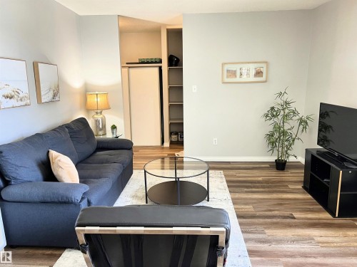 103 8310 Jasper Avenue, Edmonton, AB - Indoor Photo Showing Living Room