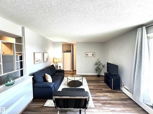 103 8310 Jasper Avenue, Edmonton, AB - Indoor Photo Showing Living Room