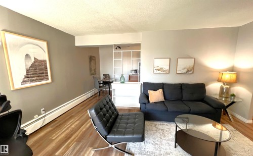 103 8310 Jasper Avenue, Edmonton, AB - Indoor Photo Showing Living Room