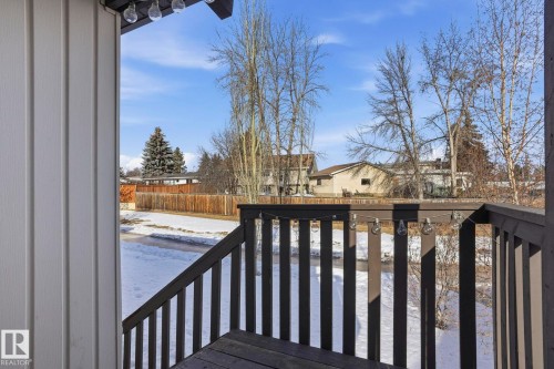 Snow covered deck with a residential view - Edmonton, AB - Outdoor