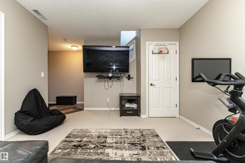 103 13825 155 Avenue, Edmonton, AB - Indoor Photo Showing Gym Room