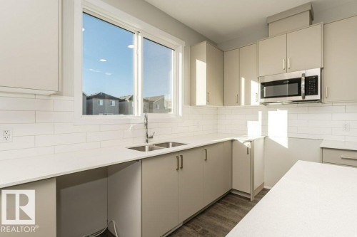 6409 63 Street, Beaumont, AB - Indoor Photo Showing Kitchen With Double Sink