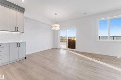 Unfurnished dining area featuring light wood-style floors and recessed lighting - 