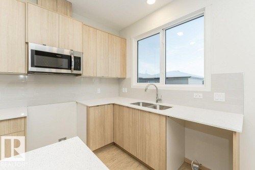 17548 63 Street, Edmonton, AB - Indoor Photo Showing Kitchen With Double Sink