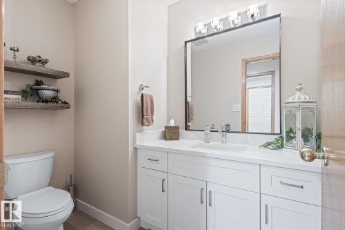 Bathroom featuring vanity and toilet - 121 Weaver Drive, Edmonton, AB - Indoor Photo Showing Bathroom