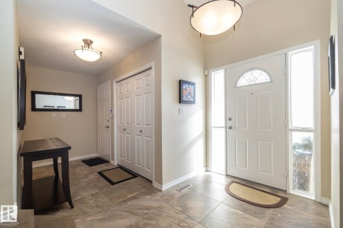 Entrance foyer with baseboards - 932 110A Street, Edmonton, AB - Indoor Photo Showing Other Room