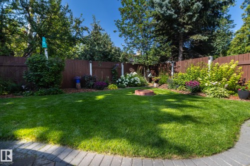View of fenced backyard - 932 110A Street, Edmonton, AB - Outdoor With Backyard