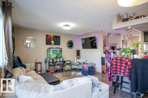 Living room with wood finished floors - 1426 25 Avenue Nw, Edmonton, AB - Indoor Photo Showing Living Room