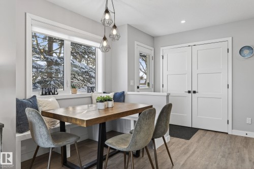 Dining area with light wood-type flooring and recessed lighting - 9103 120 Avenue, Edmonton, AB - Indoor Photo Showing Dining Room