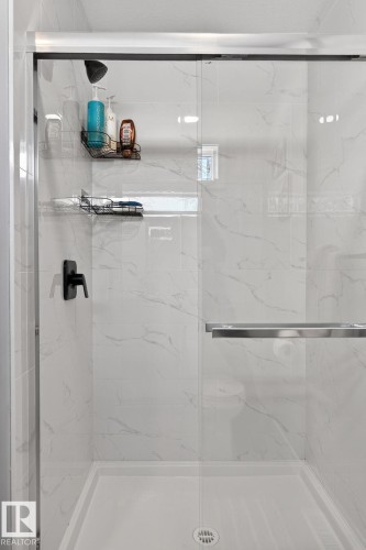 Bathroom featuring a marble finish shower - 9103 120 Avenue, Edmonton, AB - Indoor Photo Showing Bathroom