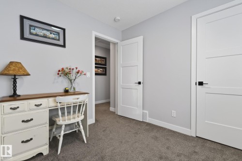 Home office featuring dark carpet and baseboards - 9103 120 Avenue, Edmonton, AB - Indoor Photo Showing Other Room