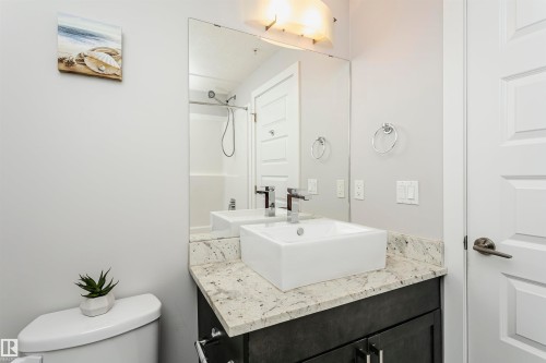 Full bathroom featuring vanity and toilet - 332 5151 Windermere Boulevard, Edmonton, AB - Indoor Photo Showing Bathroom