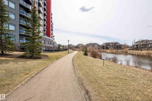 View of street featuring a residential view and a water view - 332 5151 Windermere Boulevard, Edmonton, AB - Outdoor